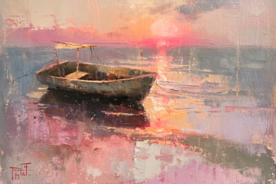 Vintage seascape ofa boat at sunset